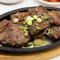 A. Galbi · Short Ribs marinated in our Aery soy-based sauce. Served with side dishes and rice.