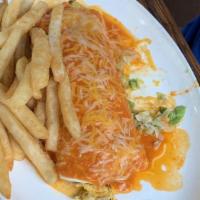 Chicken Or Steak Burrito · Large flour tortilla stuffed with slow-cooked chicken or grilled steak, refried beans or bla...