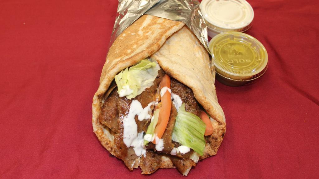 Gyro Sandwich · Combination of beef and lamb delicately spiced.