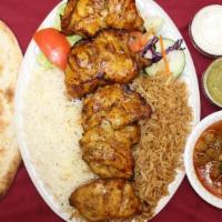 Chicken Kabob (Bone In) · Skinless fat-free chunks of chicken marinated in special seasoning.