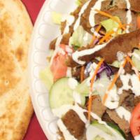 Gyro Salad · Combination of beef and lamb delicately spiced and served with fresh tandoori bread.