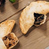 Two Empanadas Meal · Pick any two empanadas, choose the salsa and side