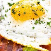 Bacon And Eggs Avocado Toast  · Classic combination of Krispies bacon and sunny side up egg. avocado fruit is  smashed on to...