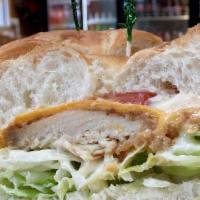 Sloppy Joe · Smoked turkey, coleslaw, Swiss, and Russian dressing stacked high on rye bread.