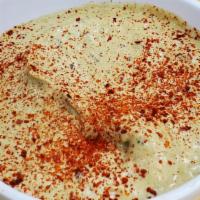 Jalapeño Hummus  · Our legendary hummus with roasted jalapeños