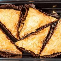 Baklava · 1 layered pastry dessert made of fill pastry, filled with chocolate, nuts and sweetened with...