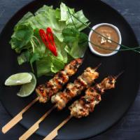 Chicken Satay · Grilled chicken or skewer served with spicy red curry peanut butter sauce.
