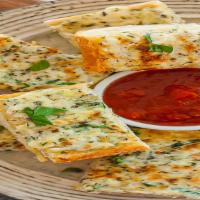 Garlic Cheese Bread · Delicious garlic cheese bread! Served with a side of marinara sauce.