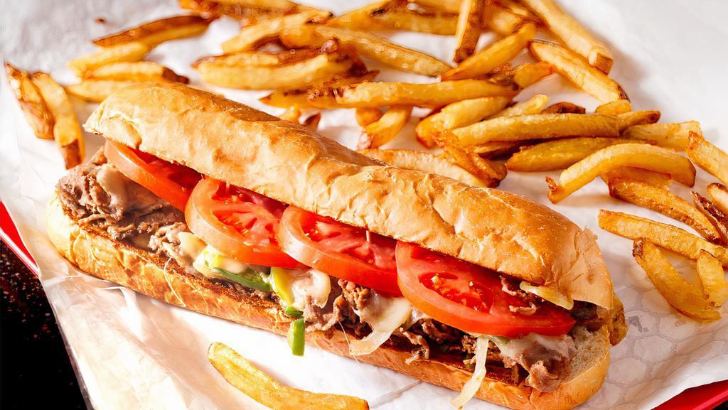 Philly Cheese Steak · Smoked Tri-tip meat, topped with sauteed mushrooms,onions,bell peppers with mozzarella cheese. Served with a side of French fries.