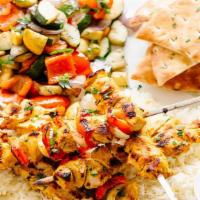 Chicken Kabob · Hummus, salad,rice, pita bread and Tzatziki sauce.