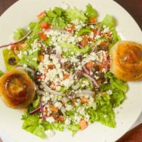 Greek Salad (Small) · Romaine lettuce, red onions, garbanzo beans, tomatoes, kalamata olives, cucumbers, and green...