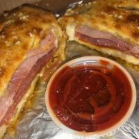 Stromboli · We take our small crust and turn it into a masterpiece. Filled with ham, pepperoni, salami a...