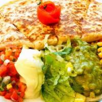 **Baja Quesadilla** · Grilled White or Wheat Flour Tortilla with cheese and choice of Meat. Choice of sides: lettu...