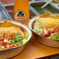 **Wet Burrito** · Flour Tortilla with choice of meat. Then warmed in the oven with Red or Verde Salsa. Served ...