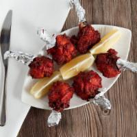 Chicken Lollipop · Chicken wings made to the shape of lollipop, marinated and fried.