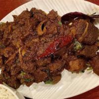 Mutton Chukka Varuval · Boneless, Chettinad dish made with tender pieces of mutton and special thick gravy you’ll fa...