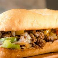 Traditional Philly  · Classic  cheesesteak; provolone, bell peppers, onions, philly roll drizzled with our house-m...
