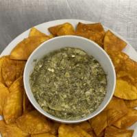 Spinach Dip · Fresh spinach , an artichoke melted with jack cheese and parmesan.