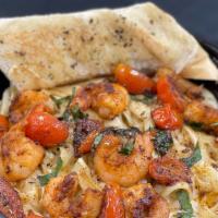 Spinach Shrimp Alfredo · Sautéed Shrimp with fresh alfredo sauce. Tossed with fresh basil and tomatoes. Served with g...