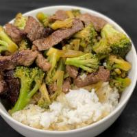 Beef And Broccoli · Marinated beef stir fried in fresh broccoli, served with steam rice.