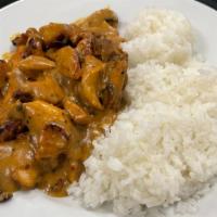 Chicken And Mushroom · Marinated Chicken sautéed with button nose mushrooms, served with steamed rice.