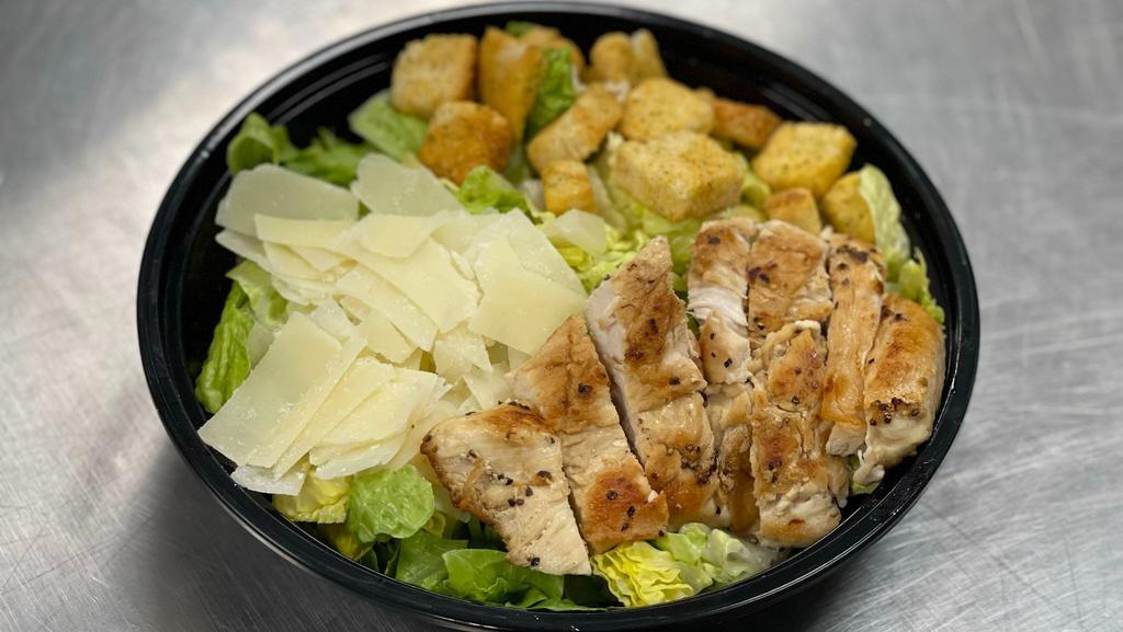 Chicken Caesar Salad · Grilled chicken, with Romaine lettuce, parmesan cheese, croutons, and Caesar dressing.