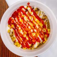 Yaroa · Mash sweet plantain spread  topped with ground beef, mozzarella  cheese, corn , ketchup and ...