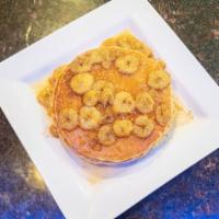 Bananas Faster Pancakes · Pancakes topped with Bananas Foster and Cream