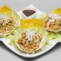 Lettuce Wraps (3) · Water chestnuts, Crispy Dry Noodles, Carrot, Celery and Pine nuts