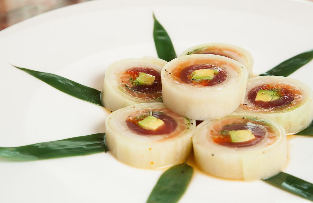 Narudo · Raw or undercooked. Tuna, salmon white fish, avocado, scallion, tobiko, wrapped in cucumber slices, served With house ponzu sauce.
