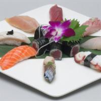 Sushi Regular (14 Pcs) · Raw or undercooked. 
 8 pcs Assorted Nigiri & 6 pcs of Tuna Roll