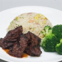 Grilled Sirloin Steak Tips,
Young Chow Fried Rice,
Served With Fresh Vegetables · Spicy.
