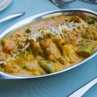 Vegetable Korma · Mixed vegetables simmered in a rich, creamy, curry sauce.