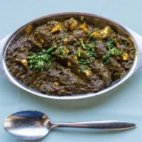 Saag Paneer · Pieces of paneer cooked in sauteed spinach with a touch of cream