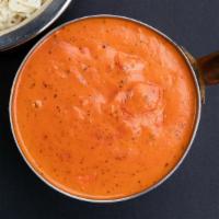 Chicken Tikka Masala · A creamy tomato sauce, blended with exotic herbs and spices.