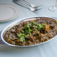 Lamb Saag · A thick, sauteed, ceamed, spinach dish.