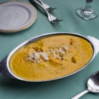 Shrimp Goan Curry · A coconut curry blended with spices and coconut milk.