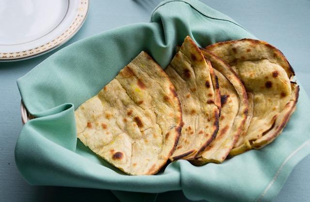 Paratha · Buttered and layered whole wheat bread.