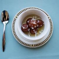 Gulab Jamun · Fried doughballs soaked in a sweet, cardamom infused syrup.
