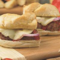 Meatball Sandwich · Meatballs covered in meat sauce, red, onions and Provolone cheese.