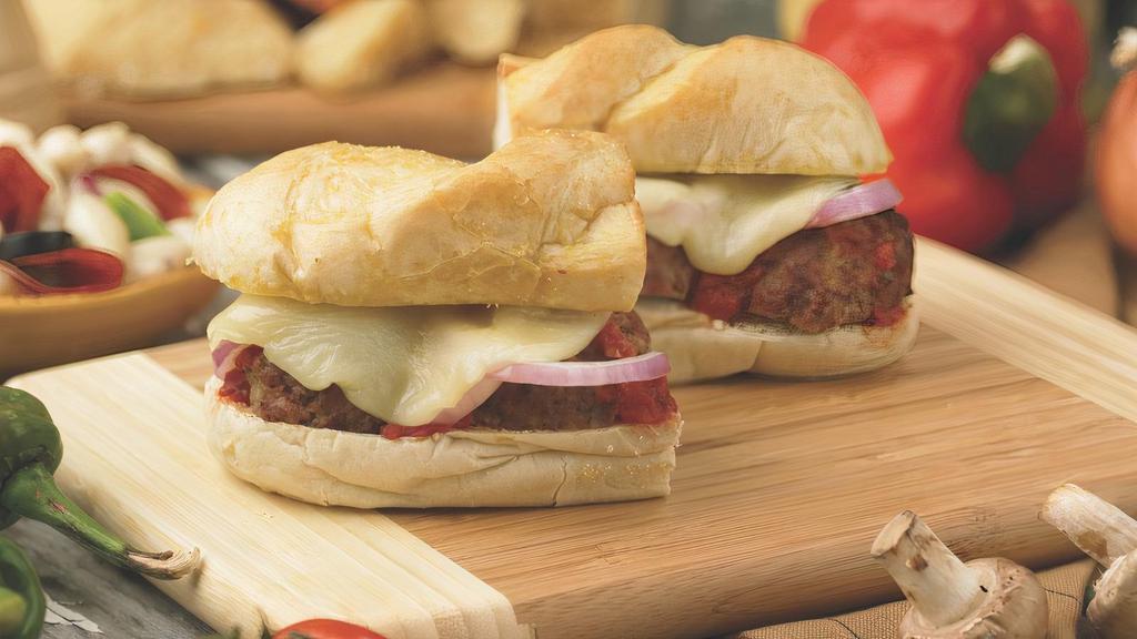 Meatball Sandwich · Meatballs covered in meat sauce, red, onions and Provolone cheese.