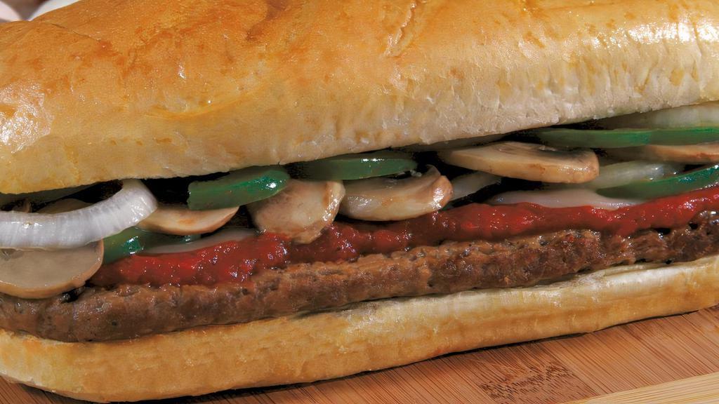 Stromboli · Choice ground steak topped with sautéed green peppers, mushrooms and onions, Provolone cheese and pizza sauce. Baked on an Italian roll.