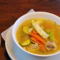 Caldo De Pollo / Chicken Soup · Sopa de pollo con verduras servidas con arroz. / Chicken soup with vegetables served with ri...