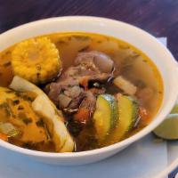Caldo De Res / Beef Soup · Sopa de carne con verduras servidas con arroz. / Beef soup with vegetables served with rice.
