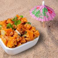 Sweet Potato Salad · Roasted sweet potato, green onions, and our spicy special sauce.