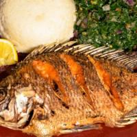 Tilapia · fried whole bone in Tilapia fish. Served with bread and coleslaw, fries or cajun rice