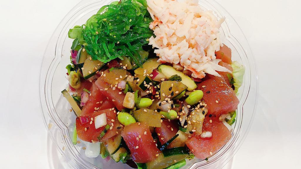 Classic Bowl · Ahi tuna, green onion, sweet onion, cucumber, edamame, crab salad, seaweed salad, roasted sesame oil, and original poke sauce.