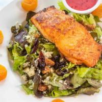 Apricot Salmon Salad · Red leaf lettuce topped with dried apricots, dried cherries, walnuts, bleu cheese, and fresh...