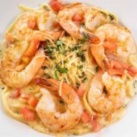 Shrimp Scampi · Jumbo shrimp, sautéed in white wine, fresh basil, garlic cream butter sauce, with tomatoes. ...