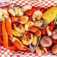Seafood Boil · Corn, potato, crawfish, shrimp, mussels, snow crab cluster.